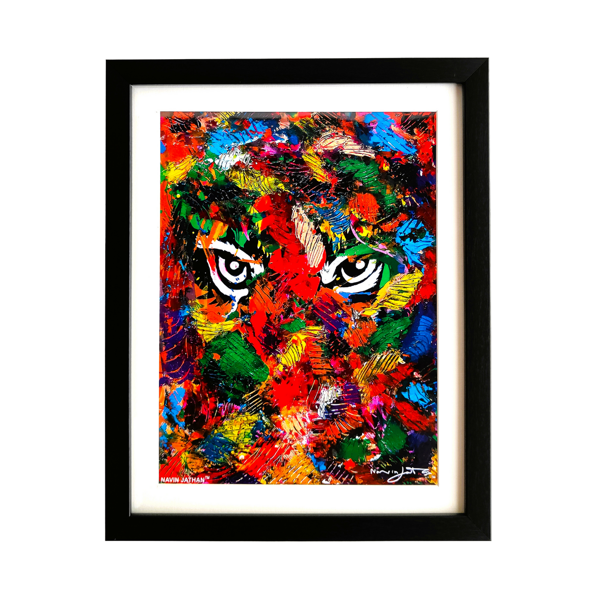 Colorful abstract painting of a tiger's face in a black frame.