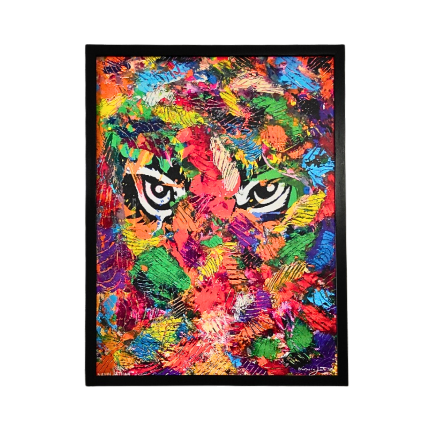 Colorful abstract painting of a tiger face with black frame