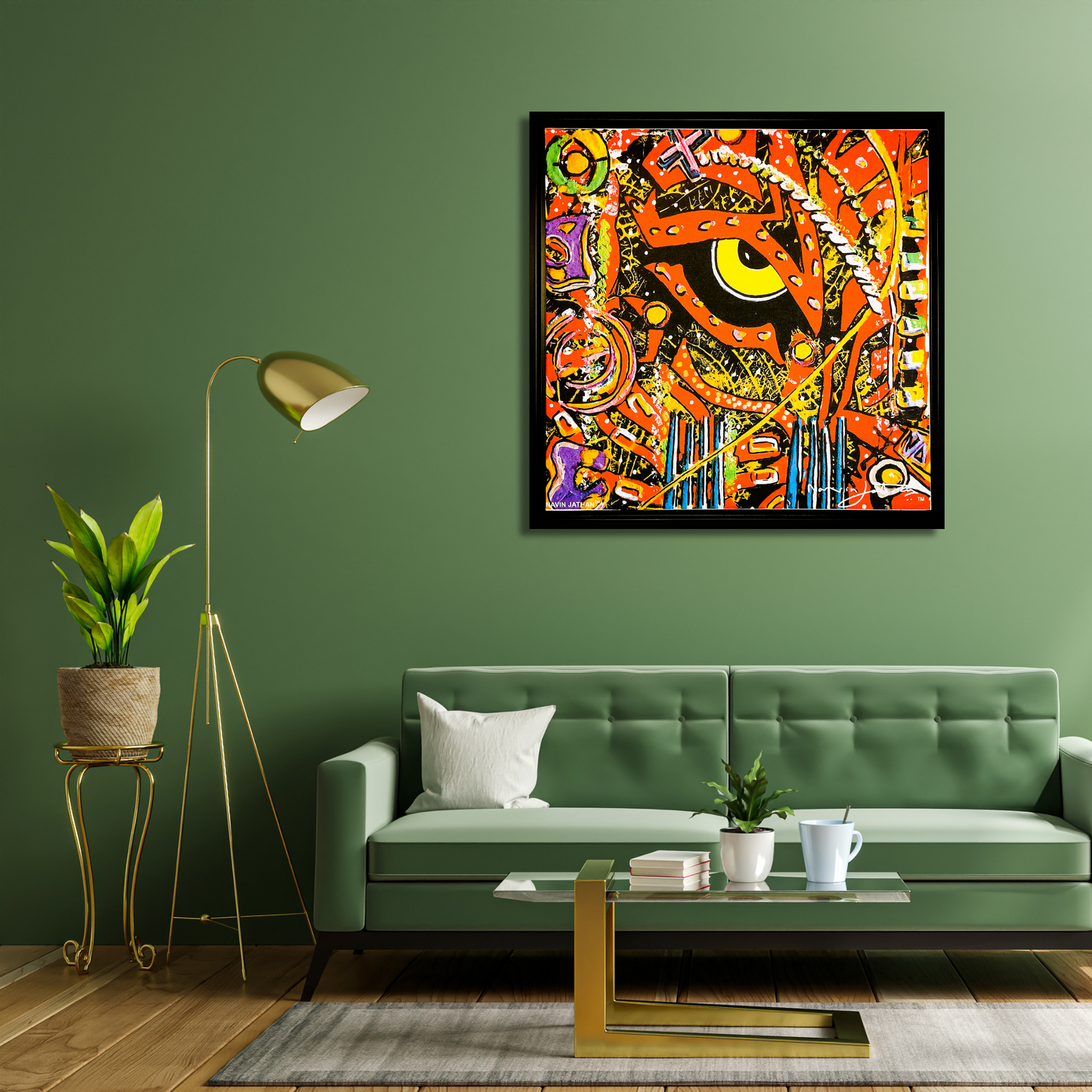 Living room with a green sofa, abstract painting on the wall, and decorative items.